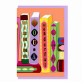 Library Collection 13 greeting card featuring illustrated books spelling "Wishing You a Wonderful Day", shown with a lavender envelope.
