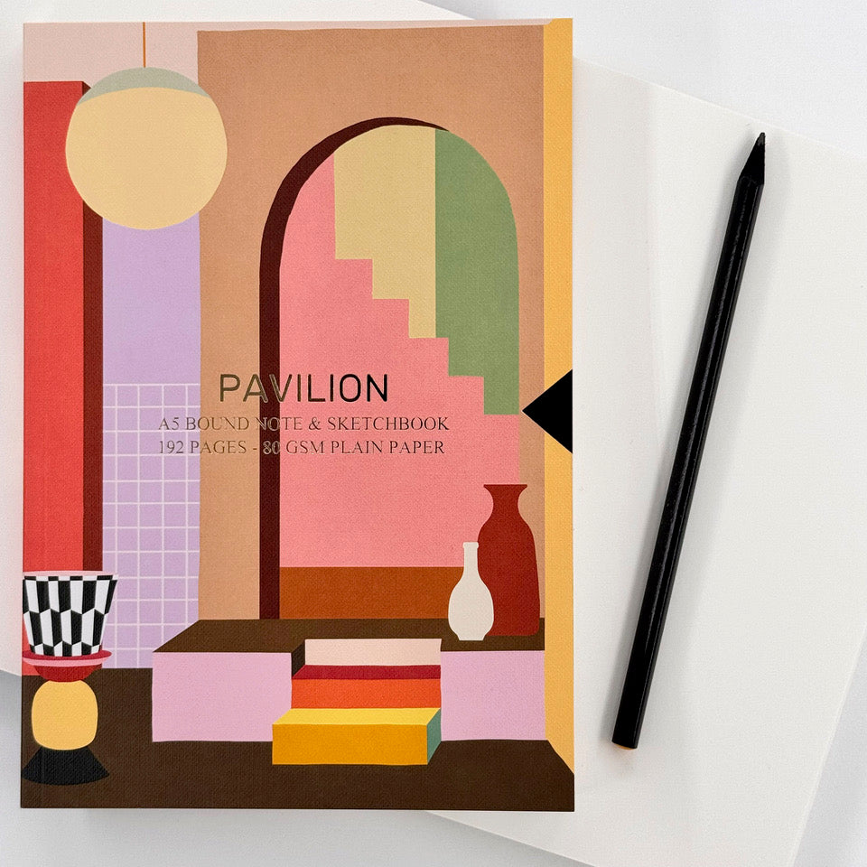 Casa A5 notebook with contemporary geometric cover design and black pencil.