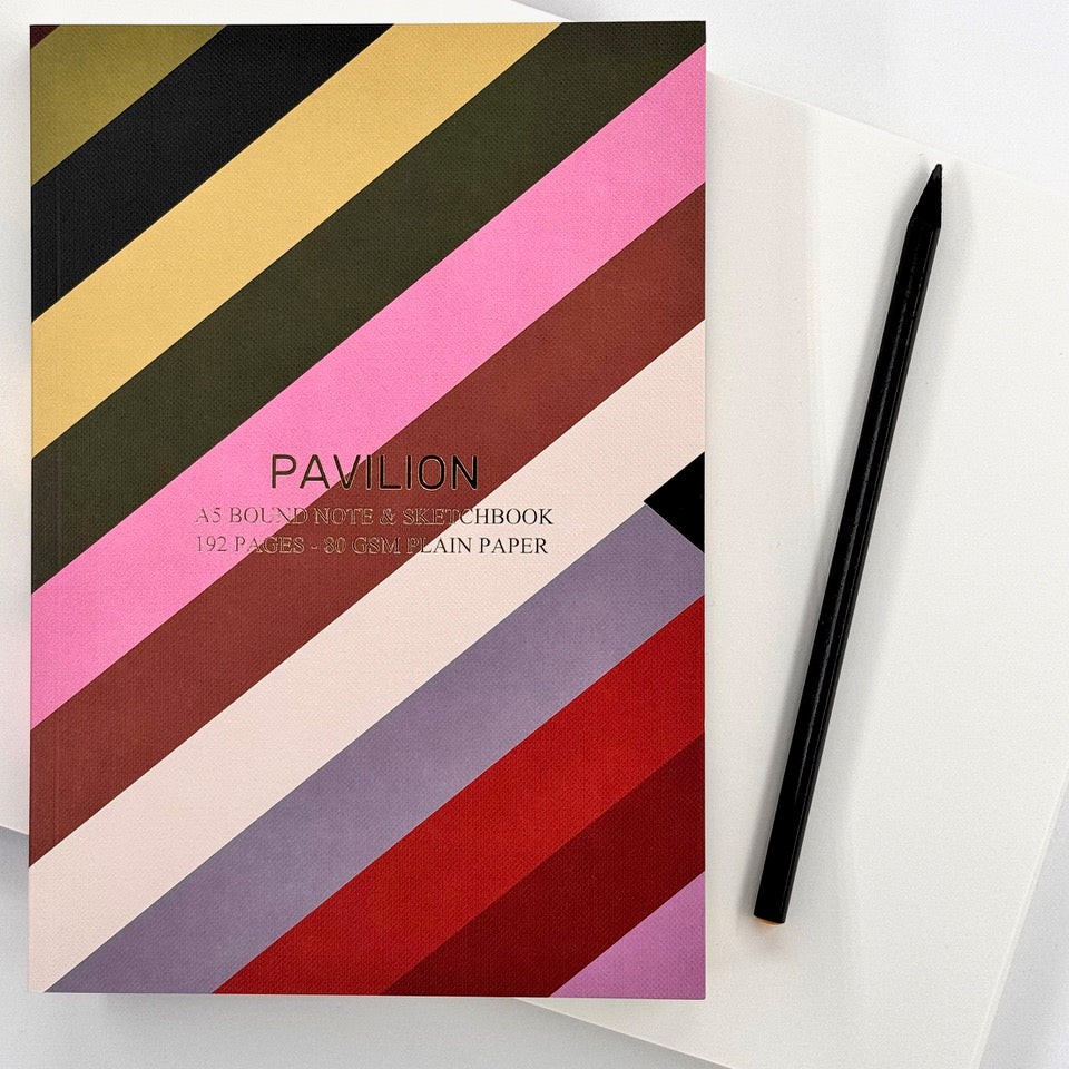 Contemporary A5 notebook with colourful diagonal stripe design and gold foil details.