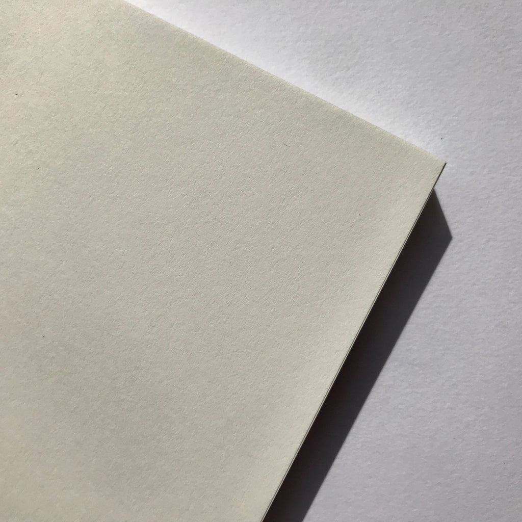 Inside view of Radar A5 notebook showing plain white pages and bound edge.