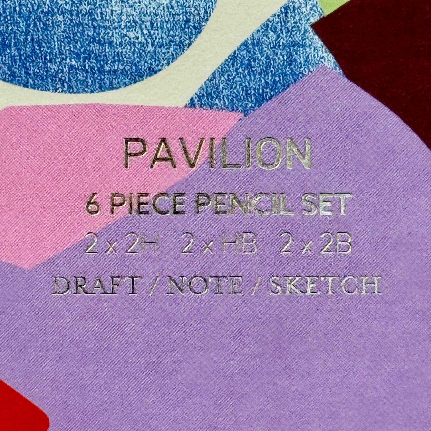Close-up of gold foil lettering on the Assemblage six piece graphite pencil set box