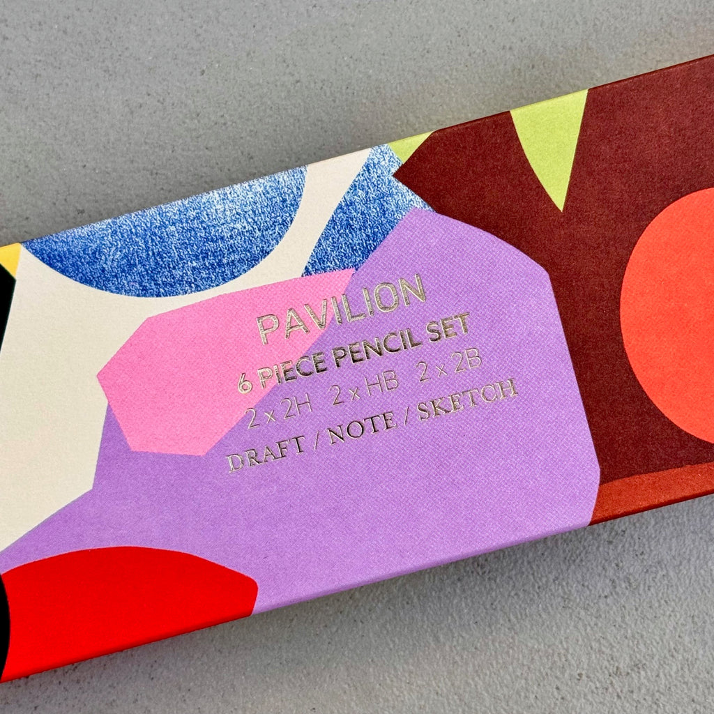 Close-up of Assemblage Pencil Set abstract box design with gold foil lettering