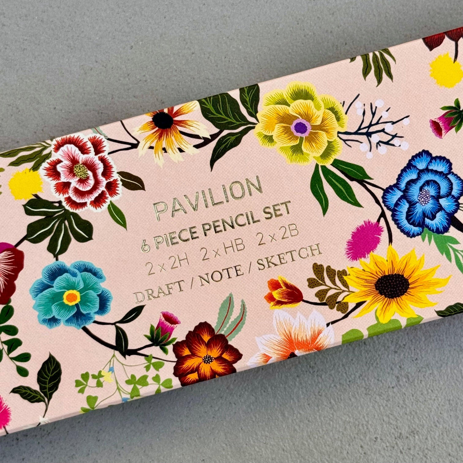 Gold foil detail on the floral Painted Garden six piece pencil set box