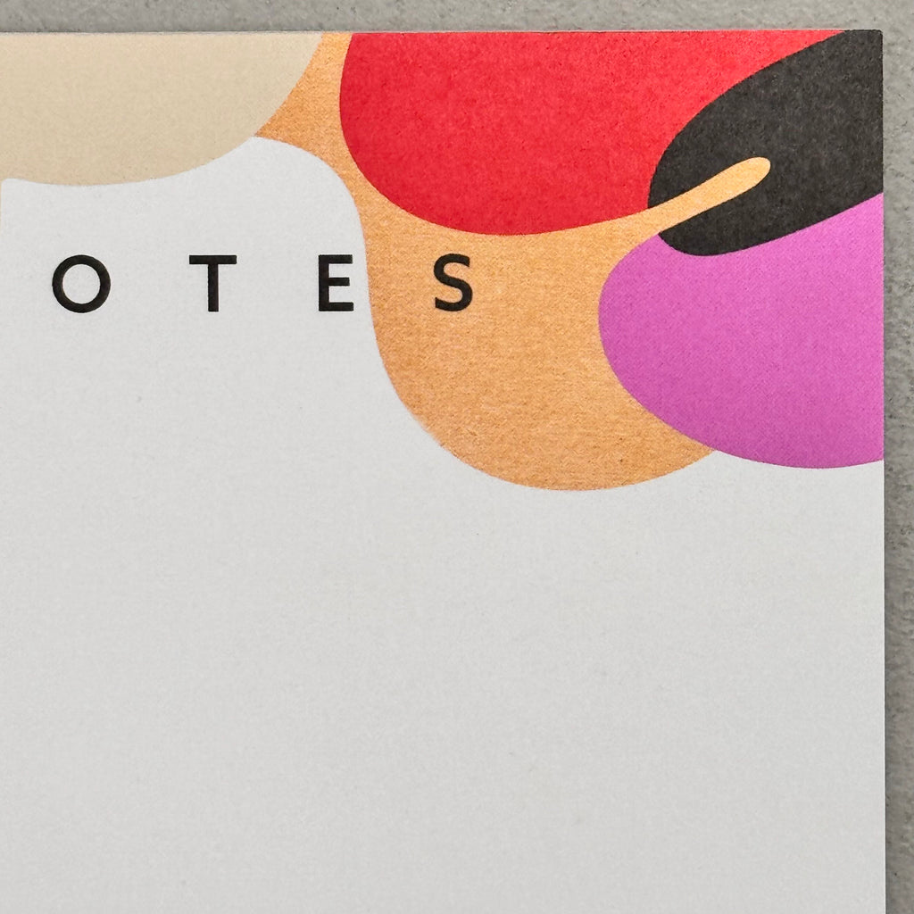 Close-up of the Assemblage A5 notepad showing colourful abstract printed detail