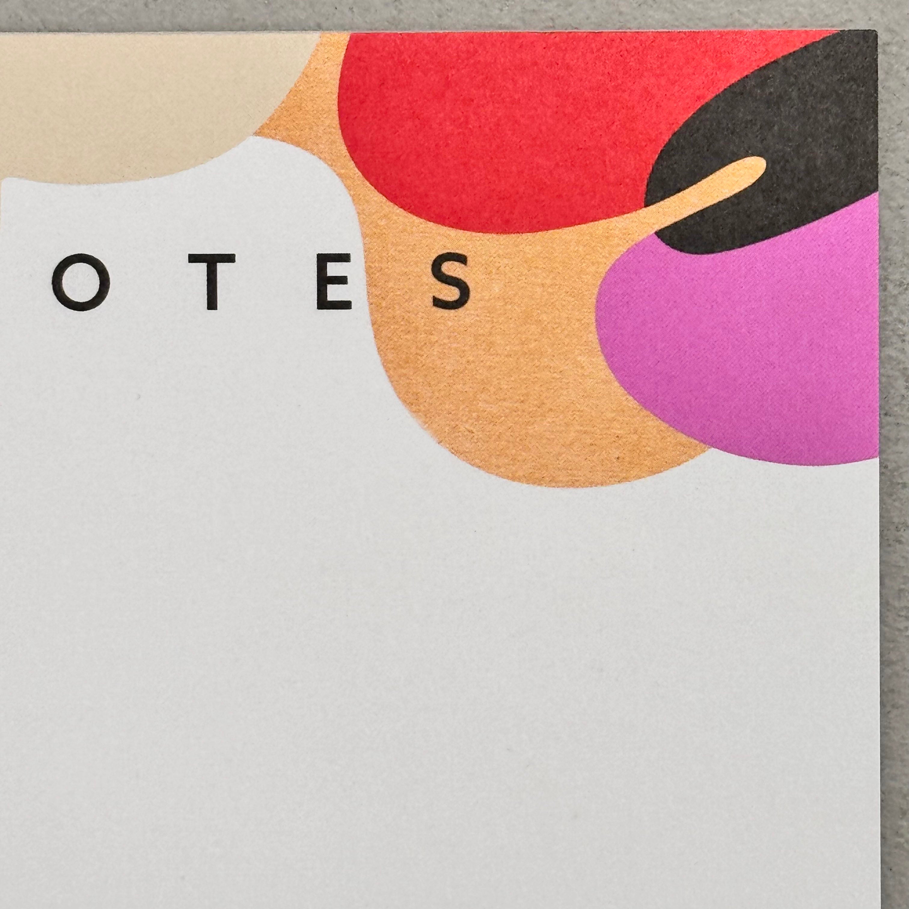 Close-up of the Assemblage A5 notepad showing colourful abstract printed detail