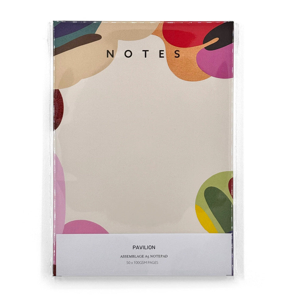 Packaged Assemblage A5 notepad showing colourful abstract border design