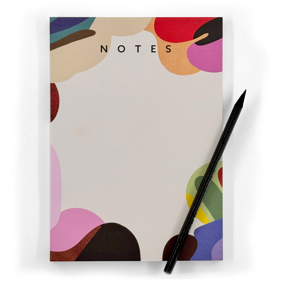Assemblage A5 notepad with colourful abstract design and black pencil