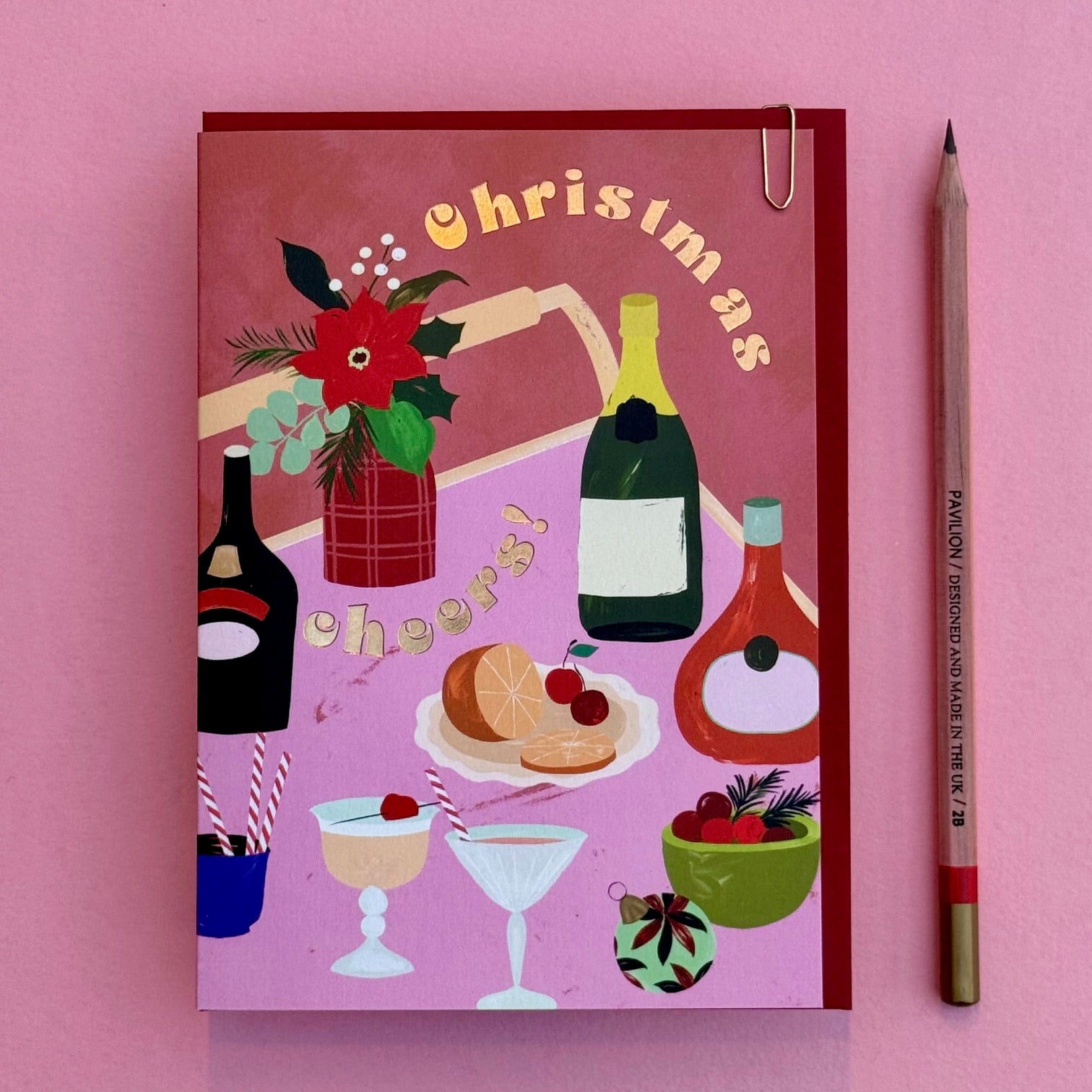 Christmas Cheers greeting card with pencil for scale