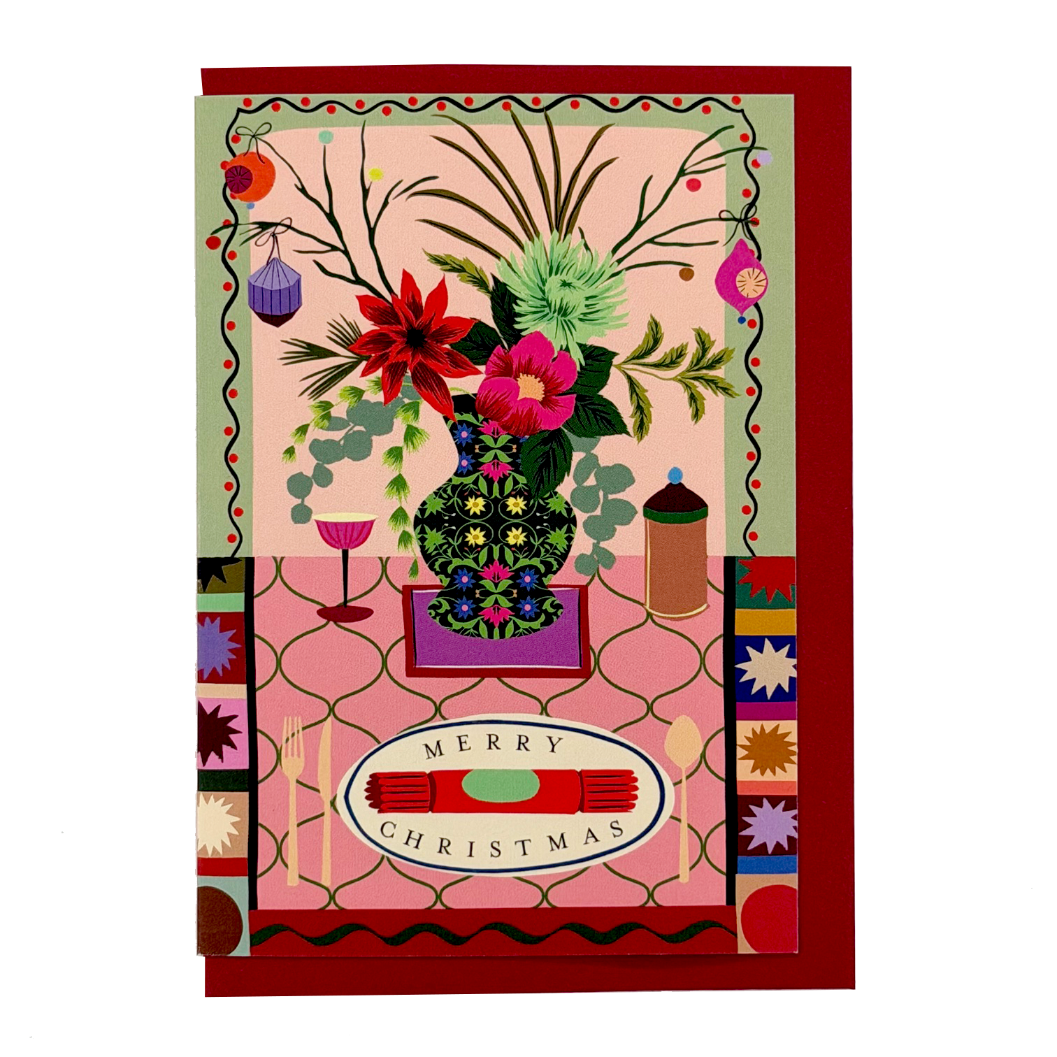 Christmas Cracker card with colourful festive tablescape, flowers and red envelope
