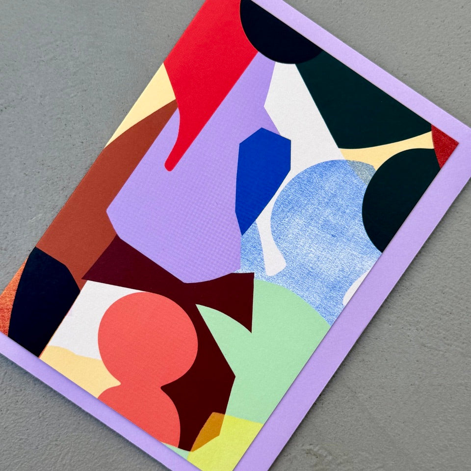 Angled view of the Composition No.1 abstract geometric greeting card with a lilac envelope.