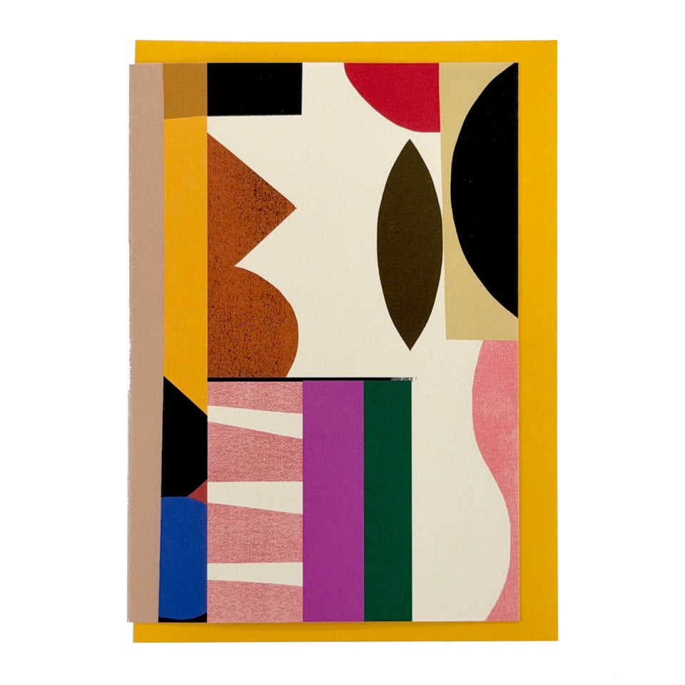Abstract geometric greeting card featuring bold modern shapes in cream, mustard, brown, pink, plum, green, blue and black, paired with a mustard yellow envelope.
