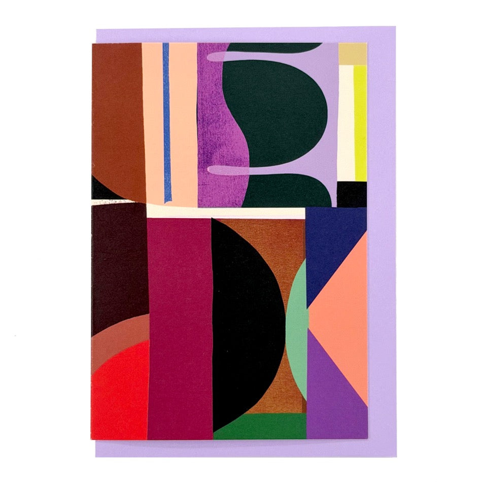 Abstract geometric greeting card featuring layered blocks and curved shapes in plum, burgundy, peach, green and navy, paired with a lilac envelope.
