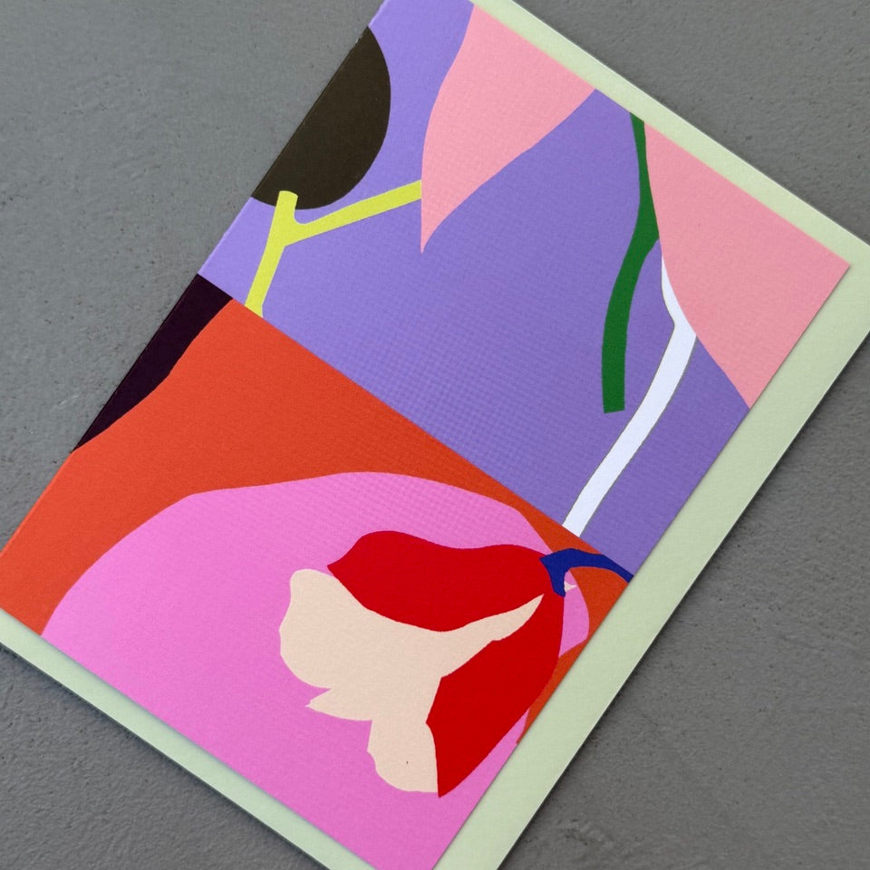 Angled view of the Diptych No. 5 card with its pale green envelope.