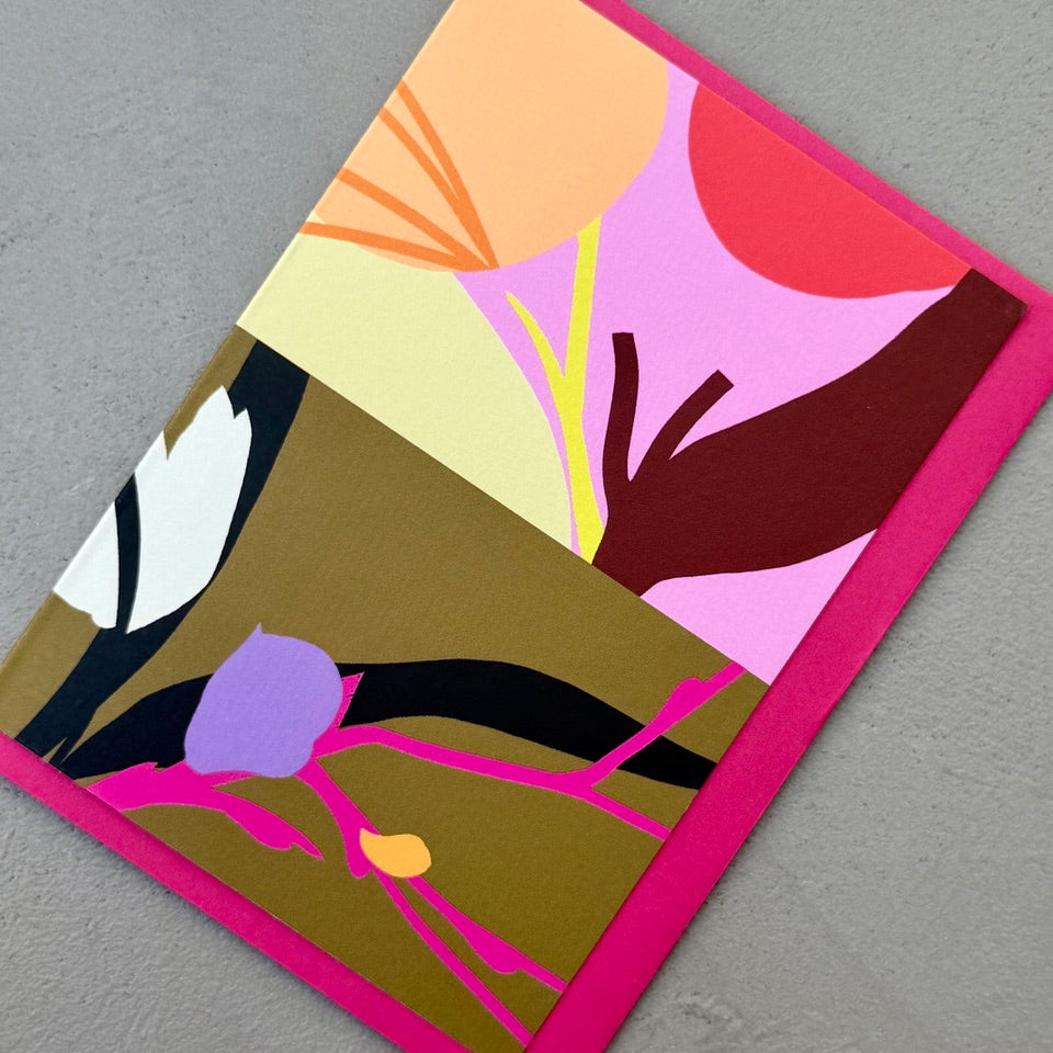 Angled view of the Diptych No. 8 card with its bright pink envelope.
