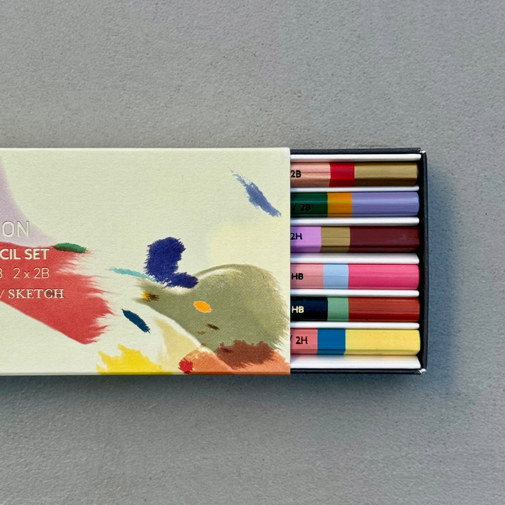 Galaxy pencil set with illustrated sleeve partly closed