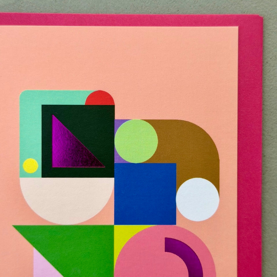 Close-up of the Geometric Abstract No.1 design highlighting layered geometric forms, vibrant colours and purple foil accents.
