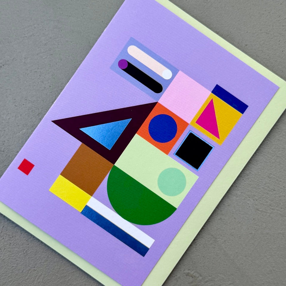 Angled view of the Geometric Abstract No.3 greeting card with a pale green envelope, showcasing the modern abstract geometric artwork.

