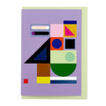 Modern abstract geometric greeting card featuring bold colourful shapes in lavender, green, blue, pink, yellow and black, paired with a pale green envelope.
