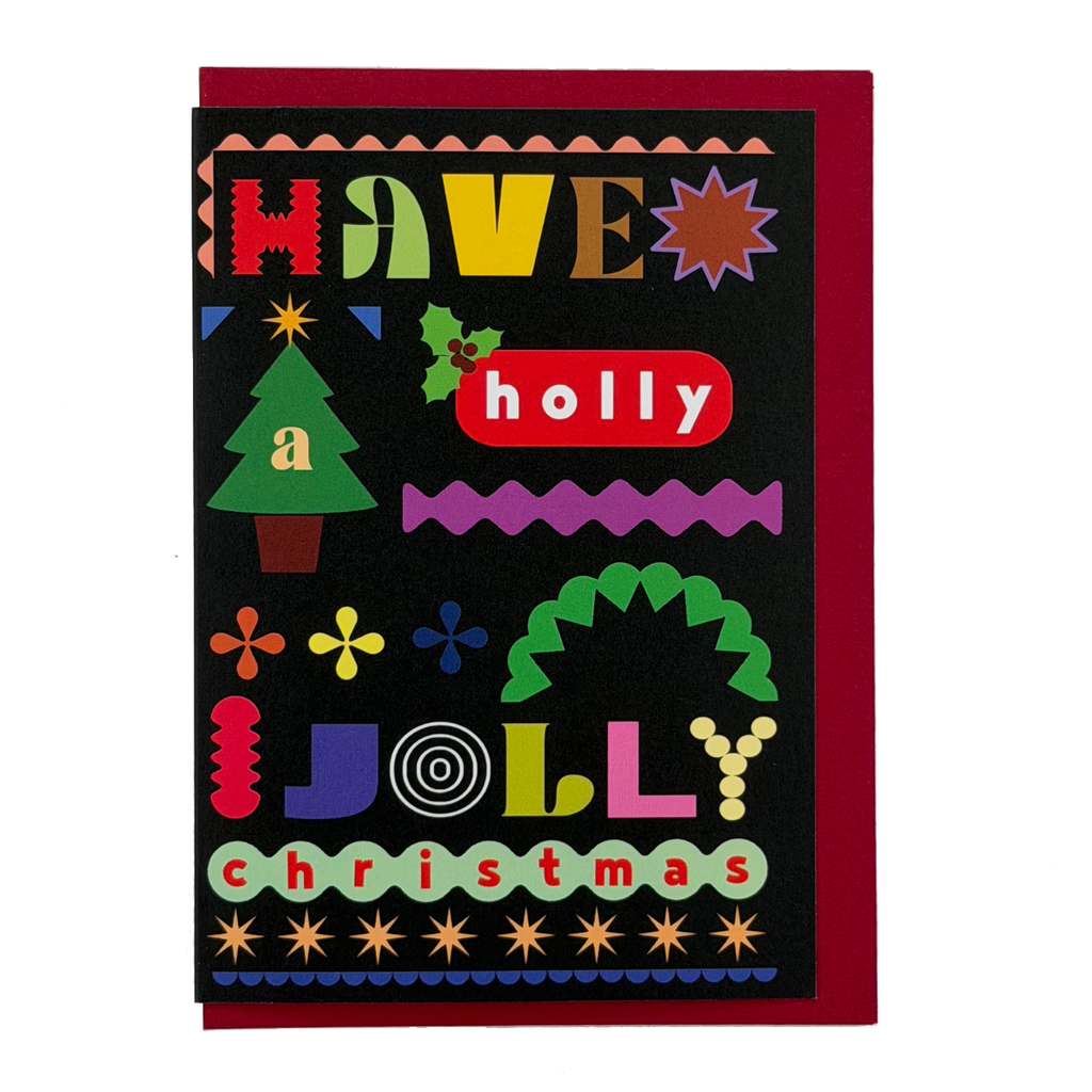 Have A Holly Jolly Christmas card by PAVILION with colourful graphic lettering, festive motifs and red envelope
