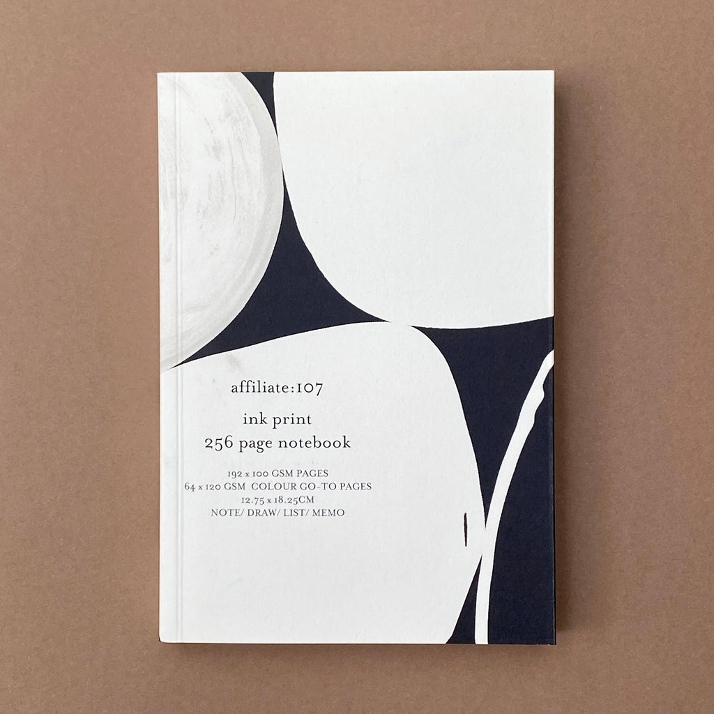 Ink Notebook with monochrome abstract circular cover design