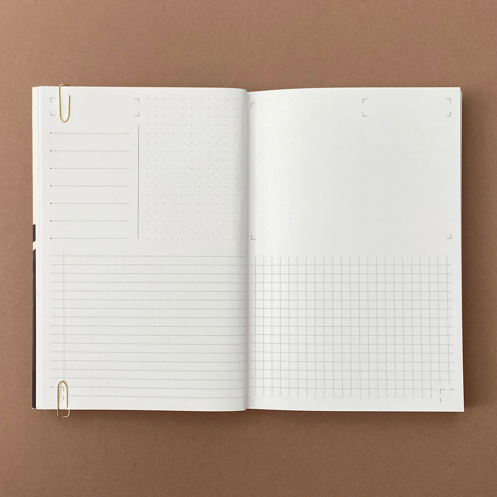 Ink Notebook open showing lined, dot grid, blank and square grid page layouts