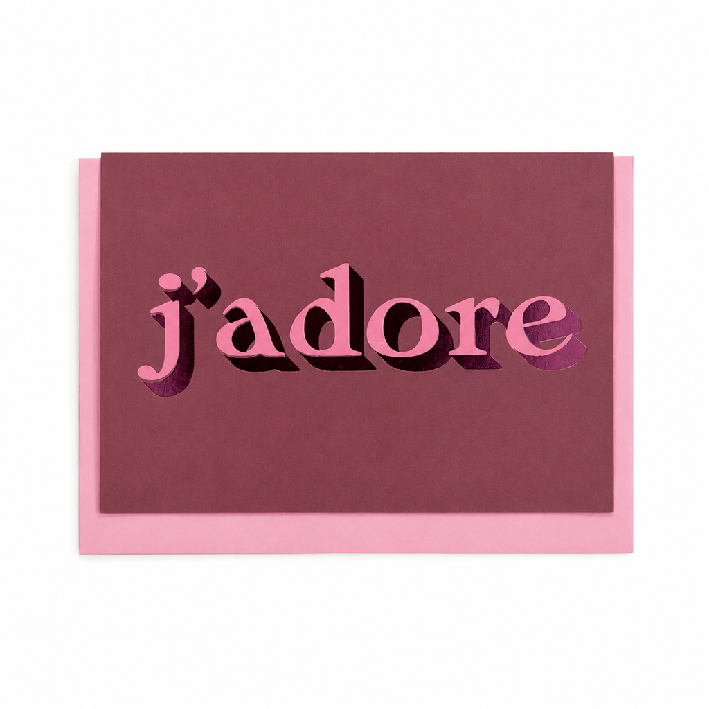 Mauve J’adore card with pink lettering and metallic pink foil detail, shown with a pink envelope.