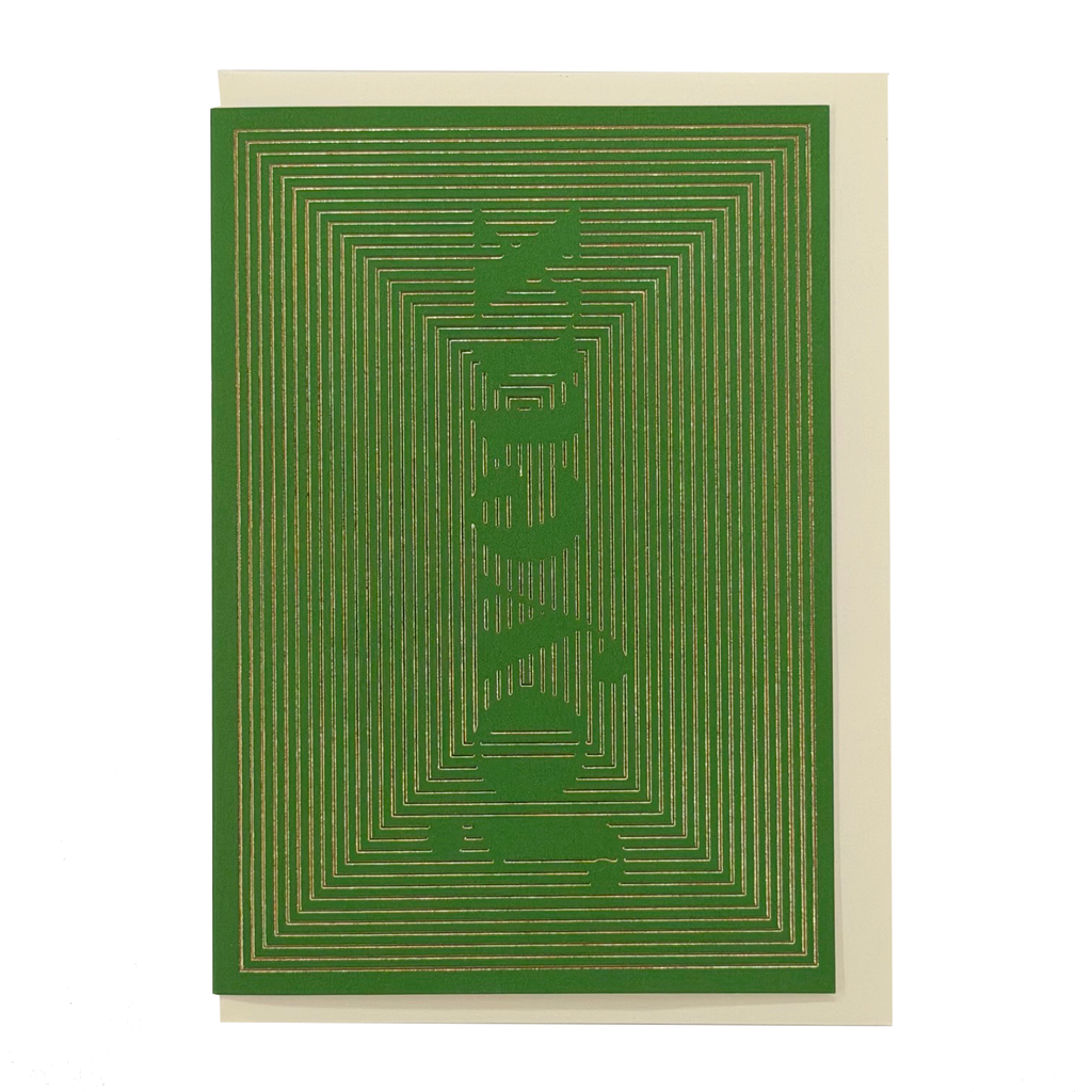 Front view of Joyeux Christmas card by PAVILION with geometric gold foil linework on green and an ivory envelope