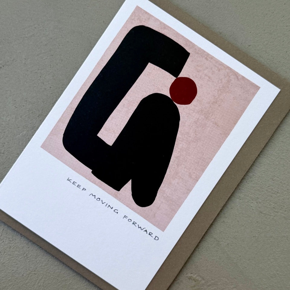 Angled view of the Keep Moving Forward greeting card with abstract artwork and a kraft envelope.