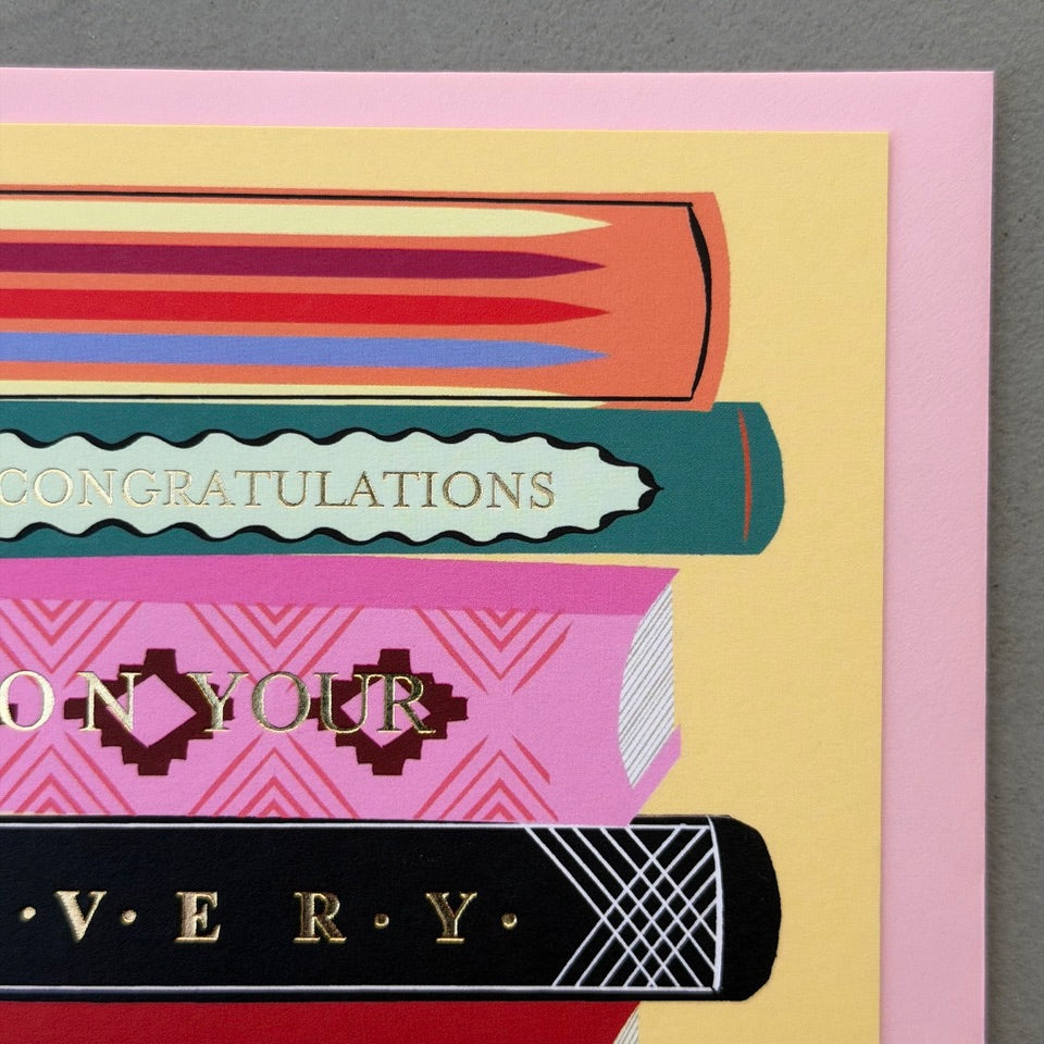 Close-up of the illustrated book spines spelling "Congratulations on your very special day" on the Library Collection 03 card.
