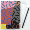 Maze A5 notebook with colourful abstract geometric cover and black pencil