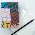 Maze A6 Notebook with colourful abstract geometric cover and lined pages