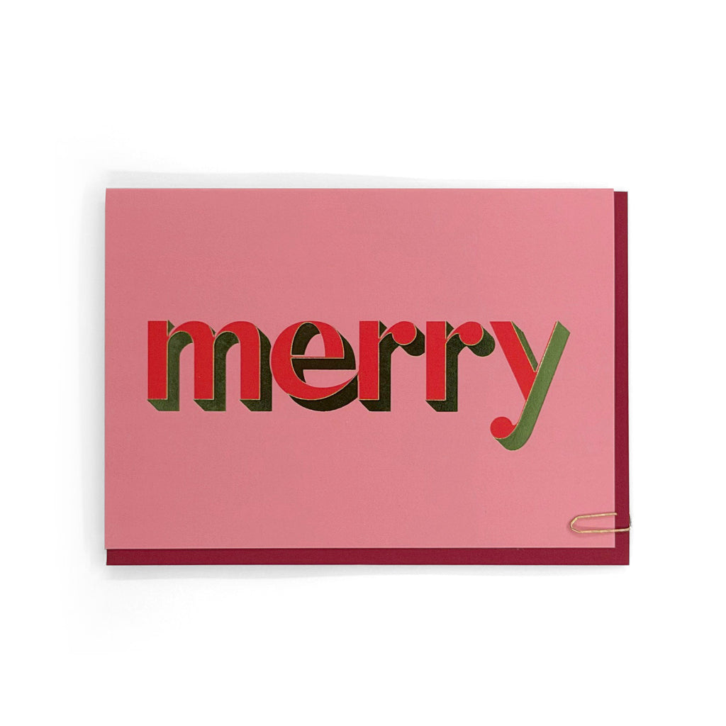 Merry Christmas card with red and green foiled typography on a white background