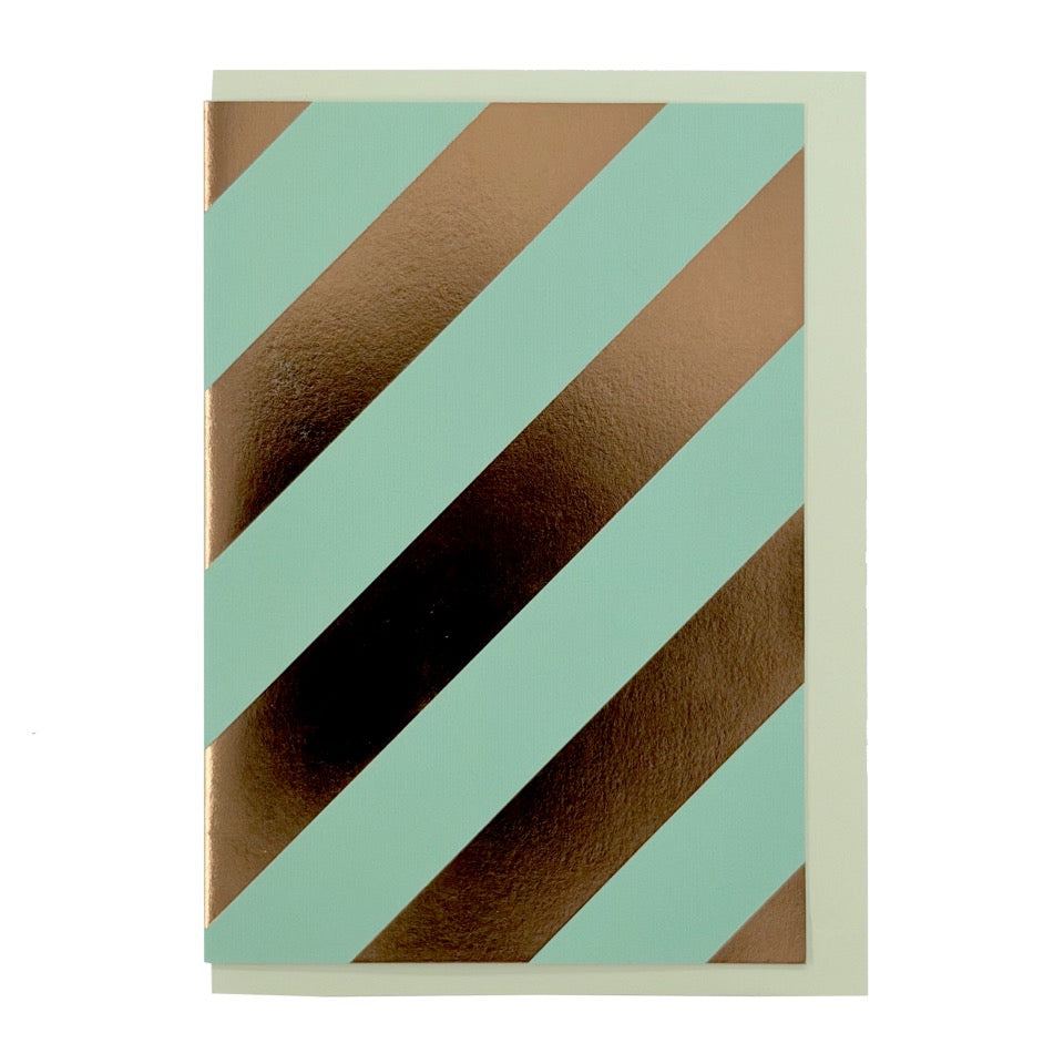 Modern geometric greeting card featuring wide diagonal copper foil stripes on a soft mint background, paired with a pale mint envelope.