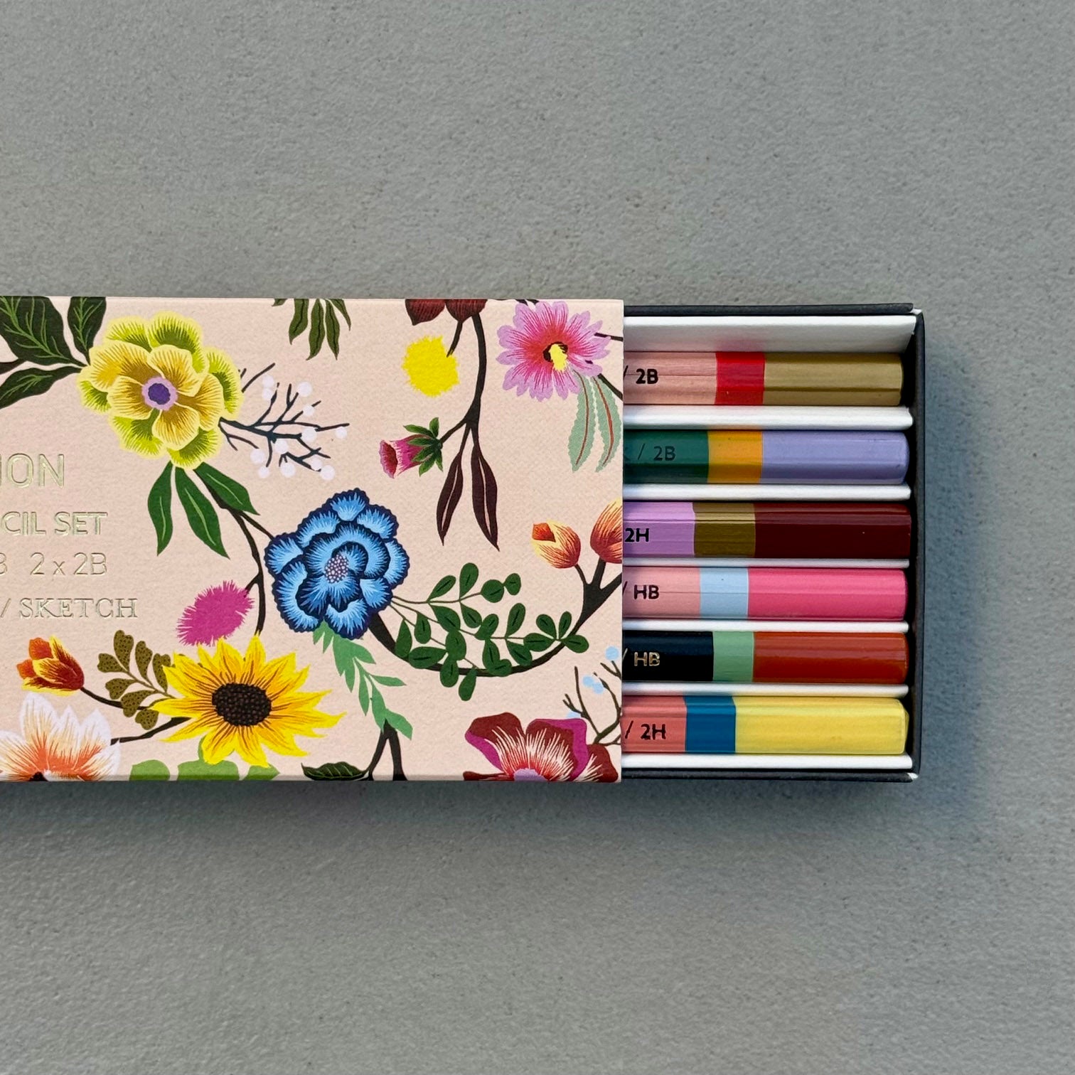 Painted Garden pencil set with six colourful graphite pencils and a floral presentation box.
