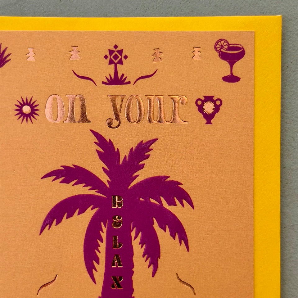 Close-up of the Relax On Your Special Day design highlighting the pink palm tree, metallic foil lettering and playful tropical illustrations.
