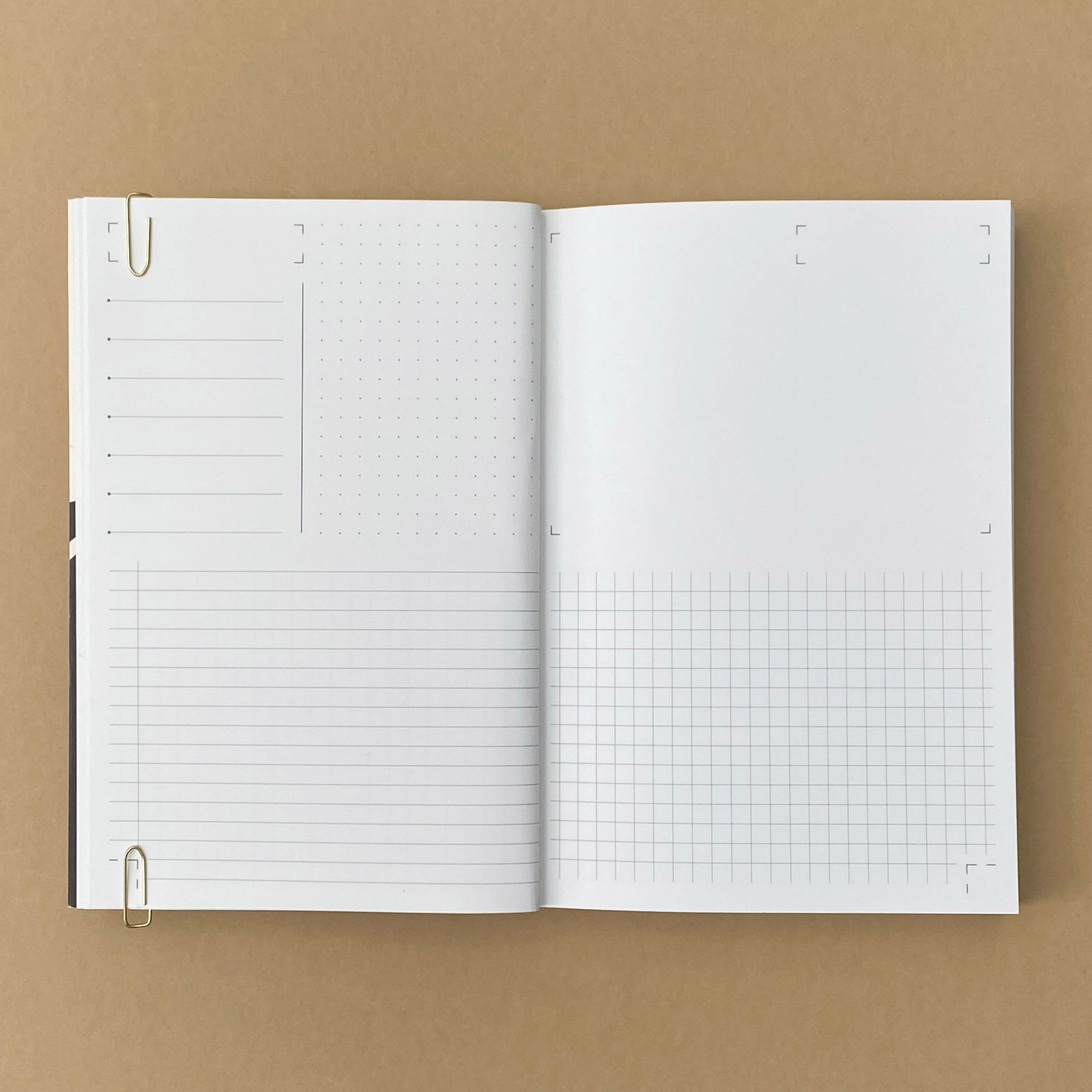 Open Rollright notebook showing lined, dot grid, blank and square grid page layouts