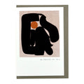 Abstract congratulations card featuring bold black organic shapes with a warm ochre circle above the words "So Proud of You", paired with a grey envelope.