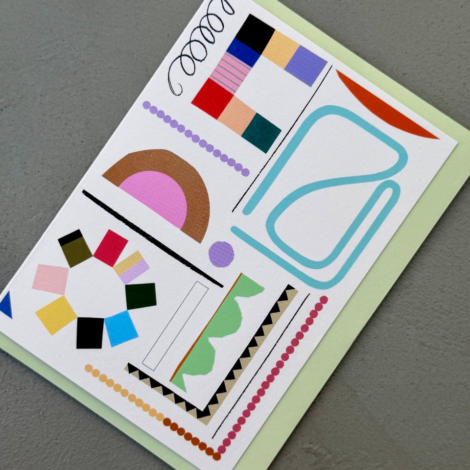 Angled view of the Studies in Colour No. 2 greeting card with a pale green envelope, showcasing the contemporary abstract design.
