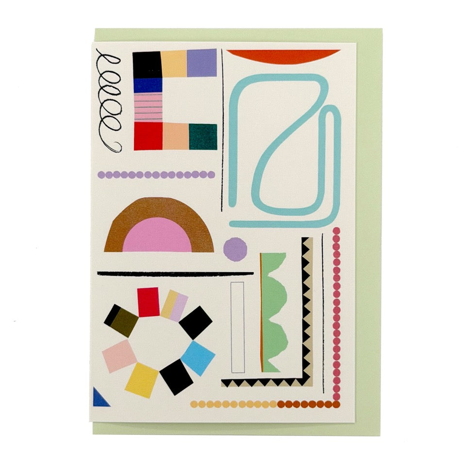 Abstract greeting card featuring colourful geometric shapes and graphic lines from the Studies in Colour collection, paired with a pale green envelope.