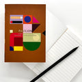 System A6 Notebook with colourful geometric cover and lined pages