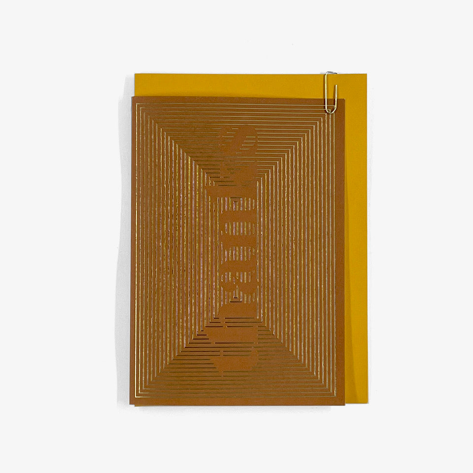 Thanks greeting card with gold foil linear typography on a brown background