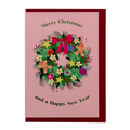 Wreath Christmas card by PAVILION with colourful festive foliage, gingerbread men, baubles, candy canes and red envelope