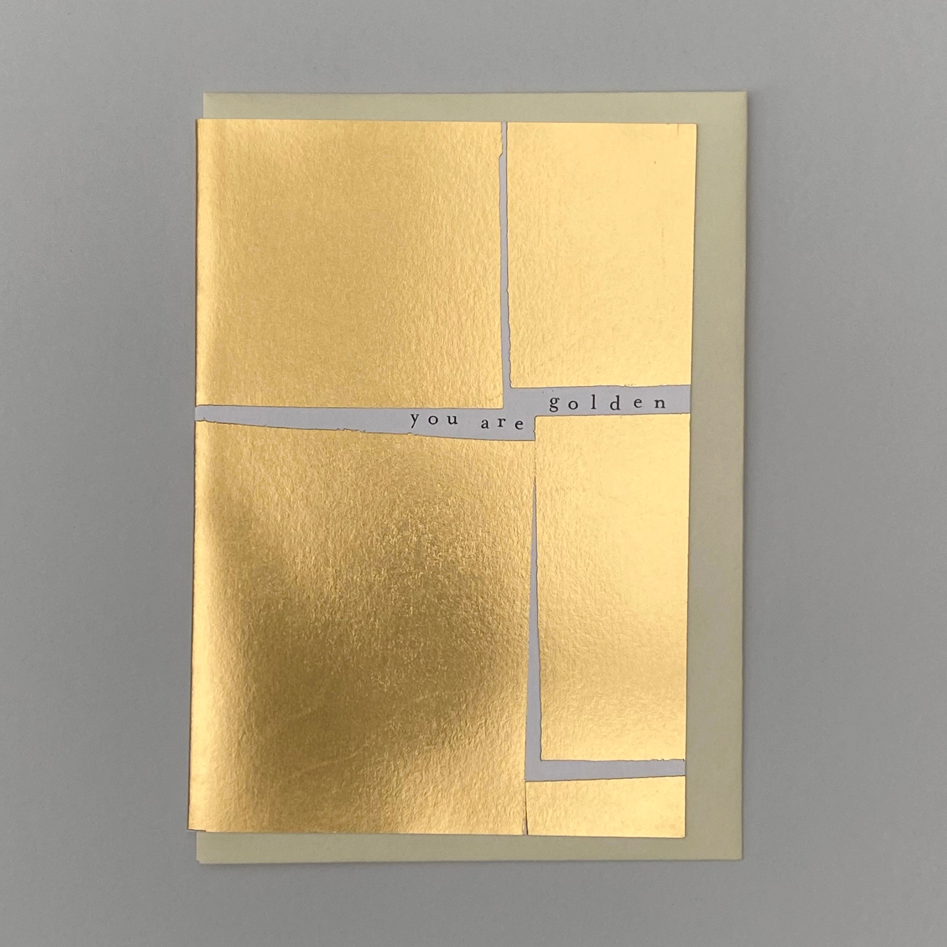 You Are Golden greeting card with cream envelope on a grey background