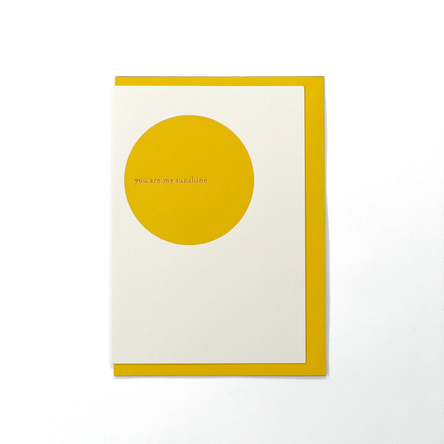 You Are My Sunshine greeting card with a yellow sun and gold foil lettering