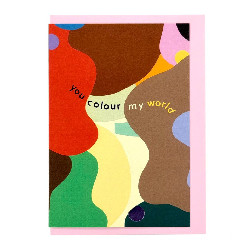 Contemporary greeting card featuring abstract colourful shapes with the message "You Colour My World", paired with a soft pink envelope.